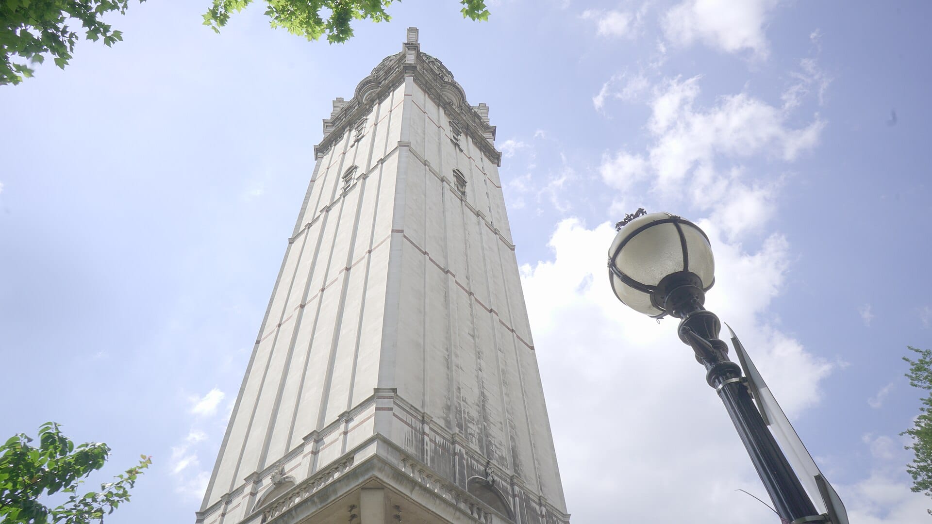 The Queen’s Tower at Imperial College London rising above a street lamp