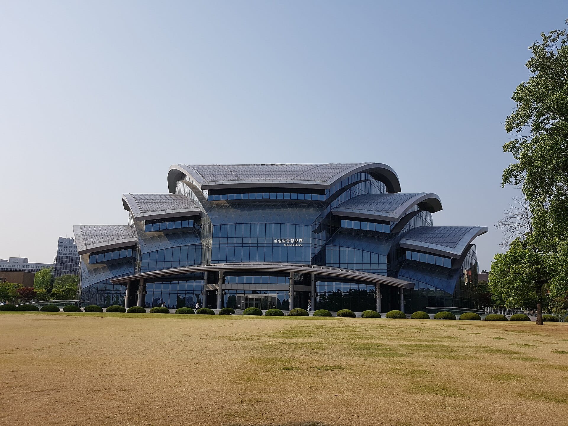 The Samsung Library at Sungkyunkwan University with sweeping metal roof forms